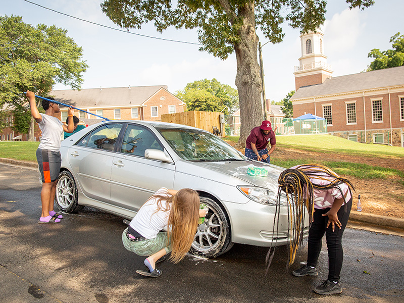 Children washing a car