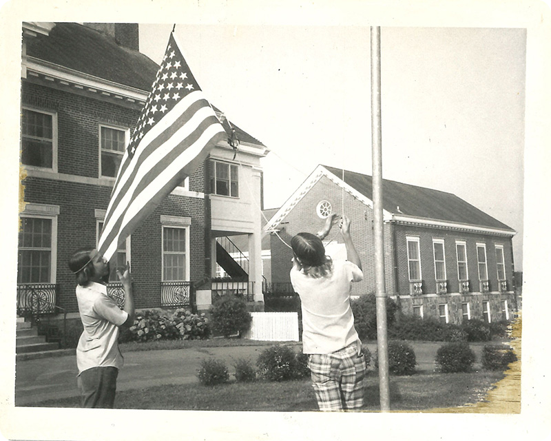 Children raising the flag